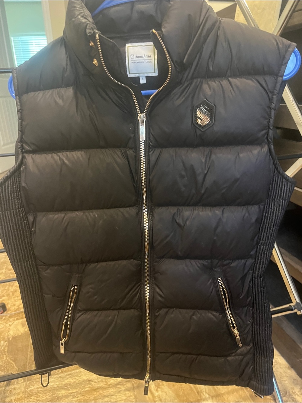 Samsheild black down vest with hood with rose gold accents